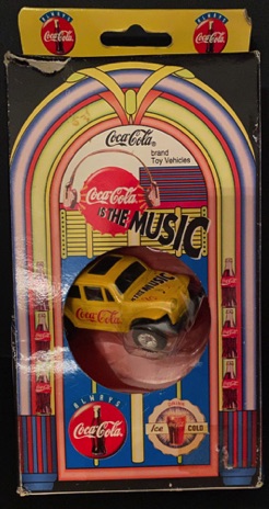 10374-1 € 5,00 coca cola auto kever met muziek ( batterij kan leeg zijn).jpeg
